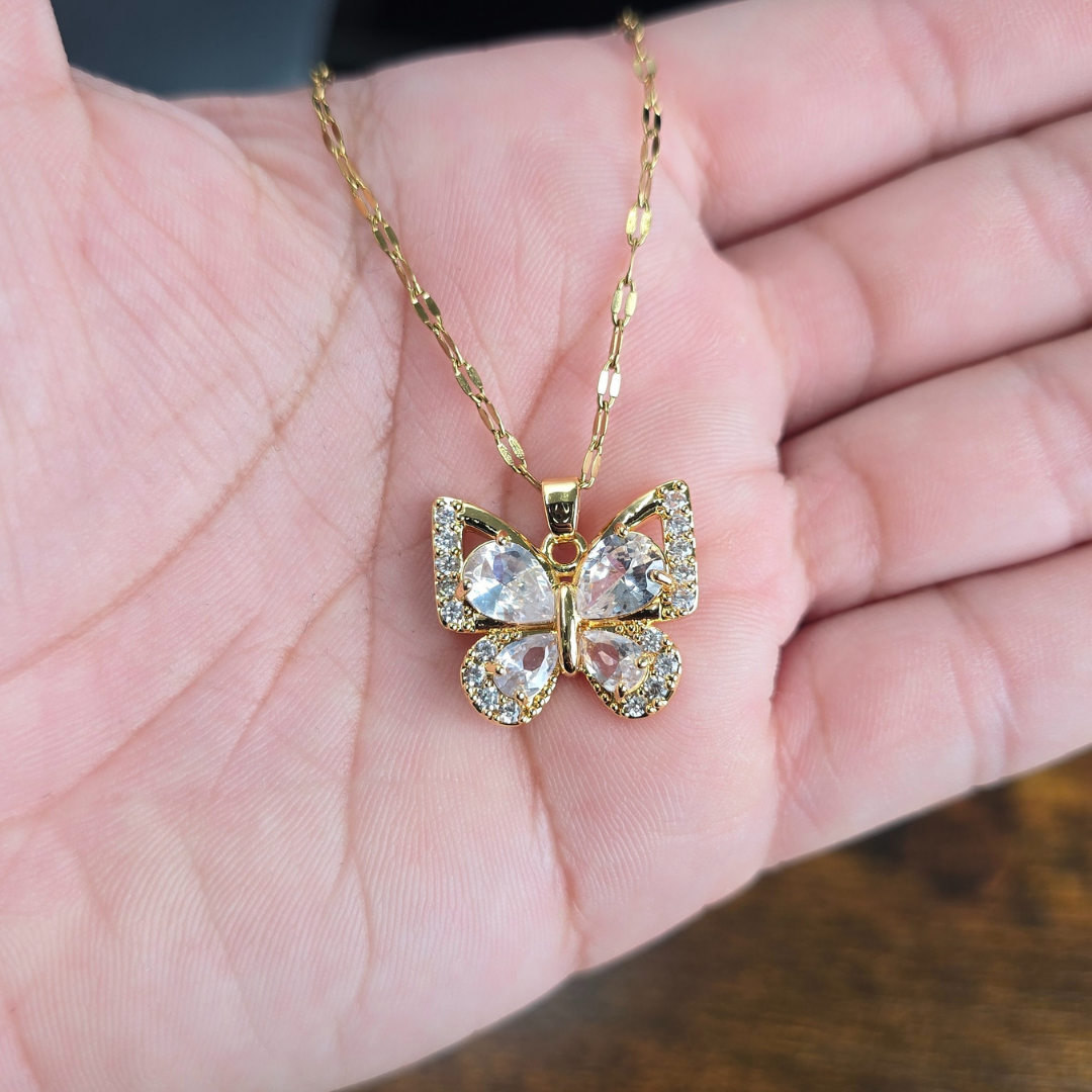 Mariposa grande oro